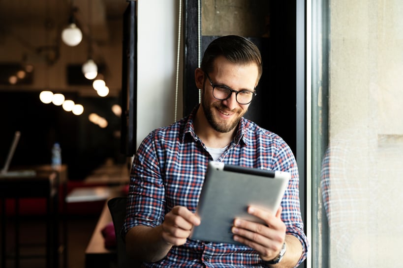 Person reading a tablet